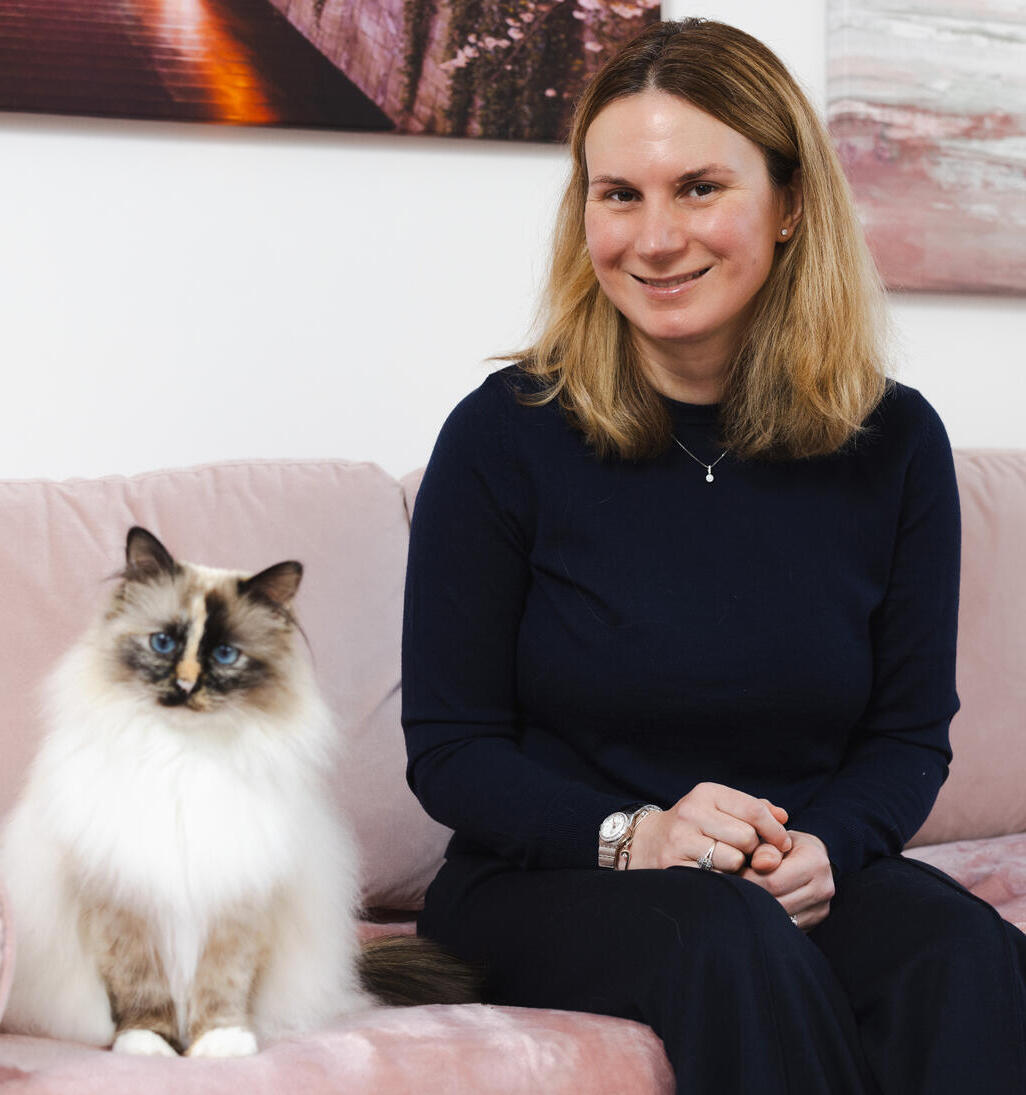 Dr Louise Legg with her white cat